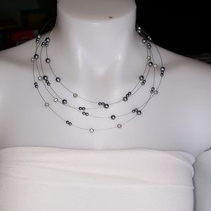 Free Nolan miller necklace With Purchase